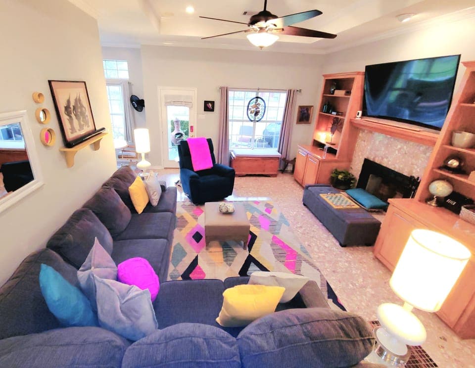 Living area with 65" curved TV