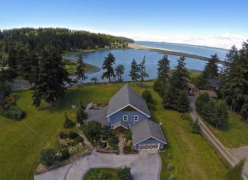 Situated on 2.5 private acres on Race Lagoon looking N to Saratoga Passage.  