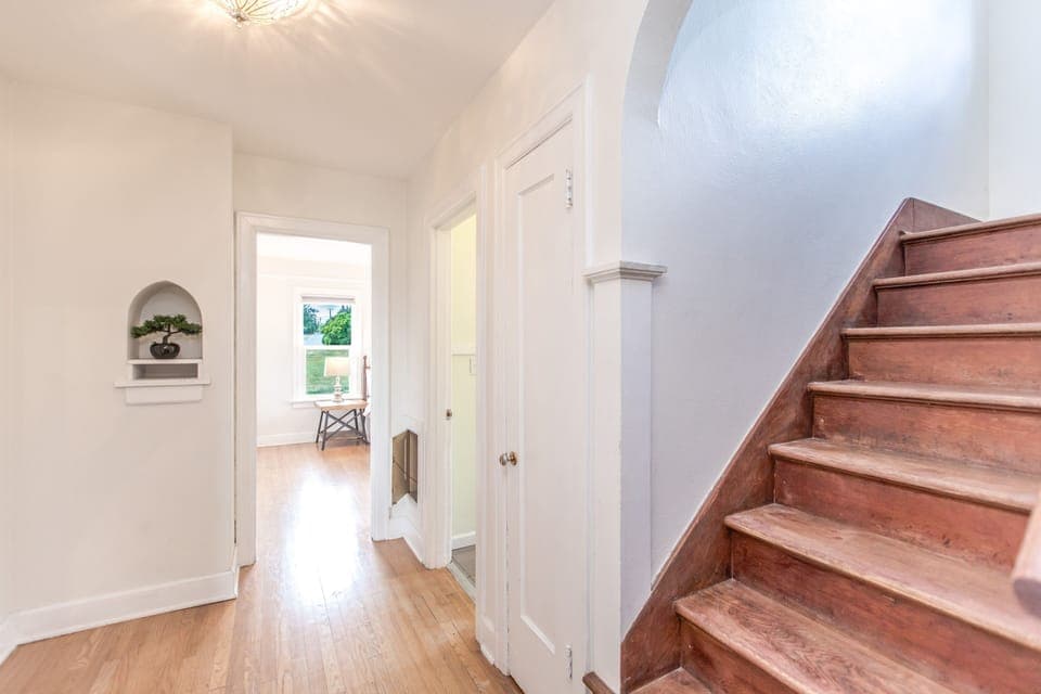 Stairs to the 2nd floor, bathroom on the right and bedroom straight