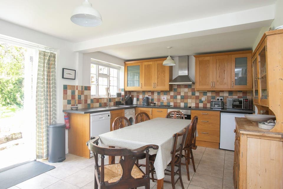 The cottage has a modern kitchen/diner that opens on to the garden.