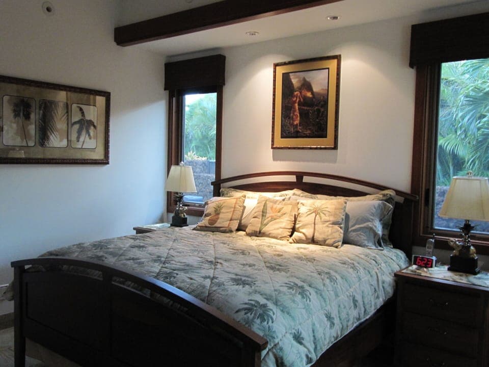 Bedroom in main house with King-sized bed, bathroom suite & HD Satellite TV