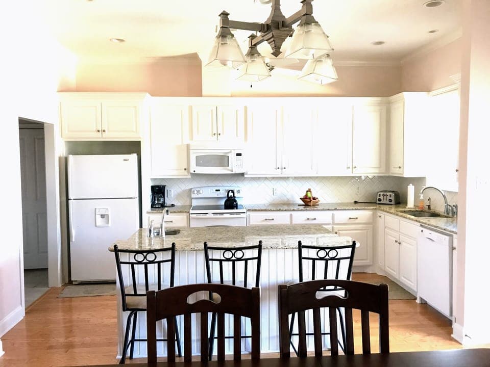 Great room with kitchen, dining and living/tv area. 