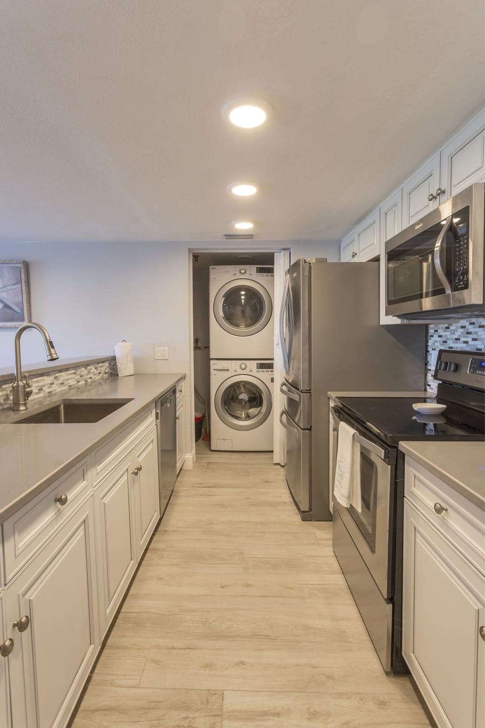 Stainless steel appliances in a fully stocked kitchen 