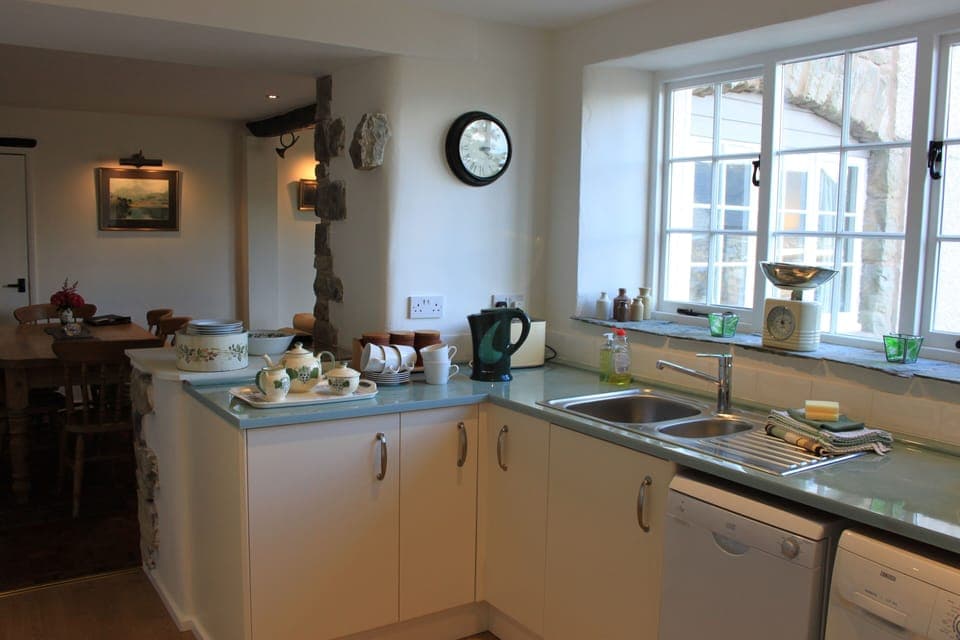 Well equipped kitchen with dishwasher, microwave, fridge/freezer.