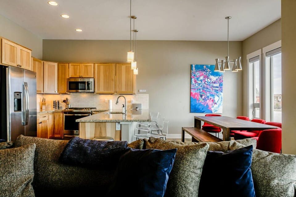 The living room flows into the kitchen and dining area