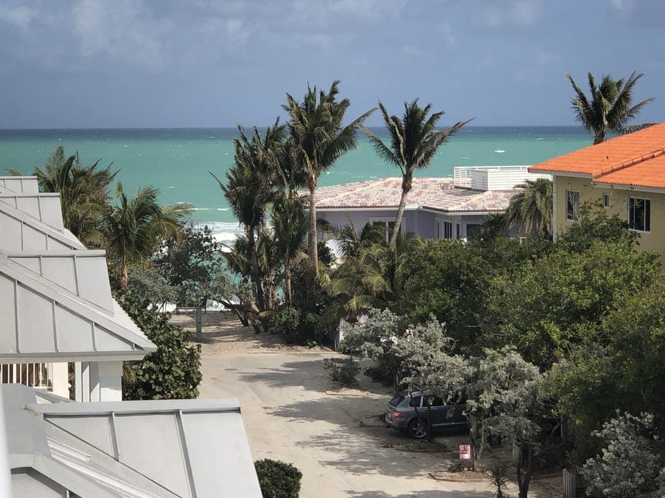 Luxury beach house is half a lazy block from white sand and turquoise water