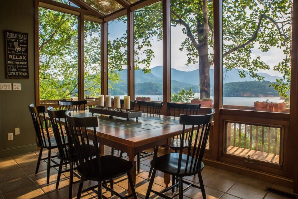 All glass walls in dining room capture the views