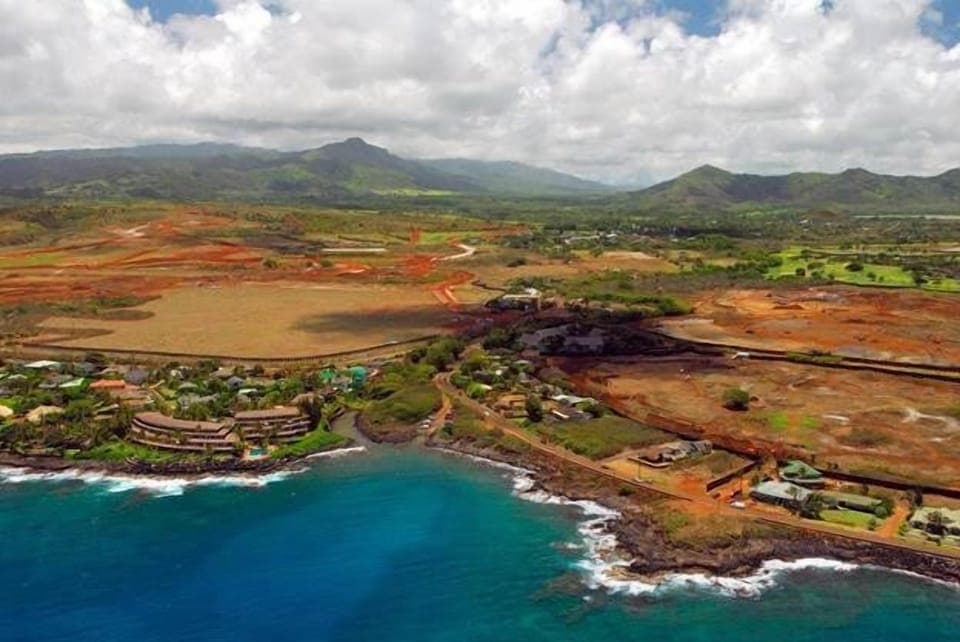 Waikomo Stream Villas (in big shadow) is near ocean and close to sandy beaches