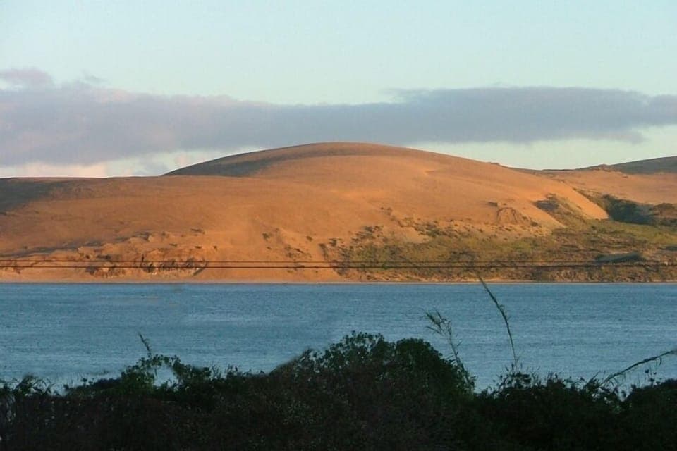 Beautiful golden sandy beach right over the road. Photo taken from balcony