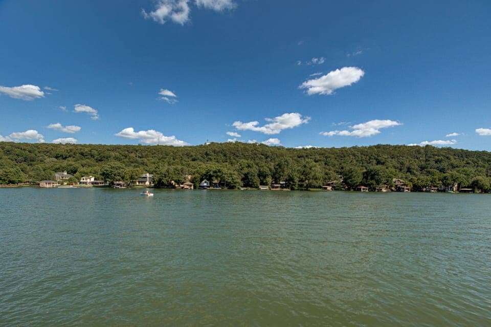 Lake Austin, directly behind the house. 