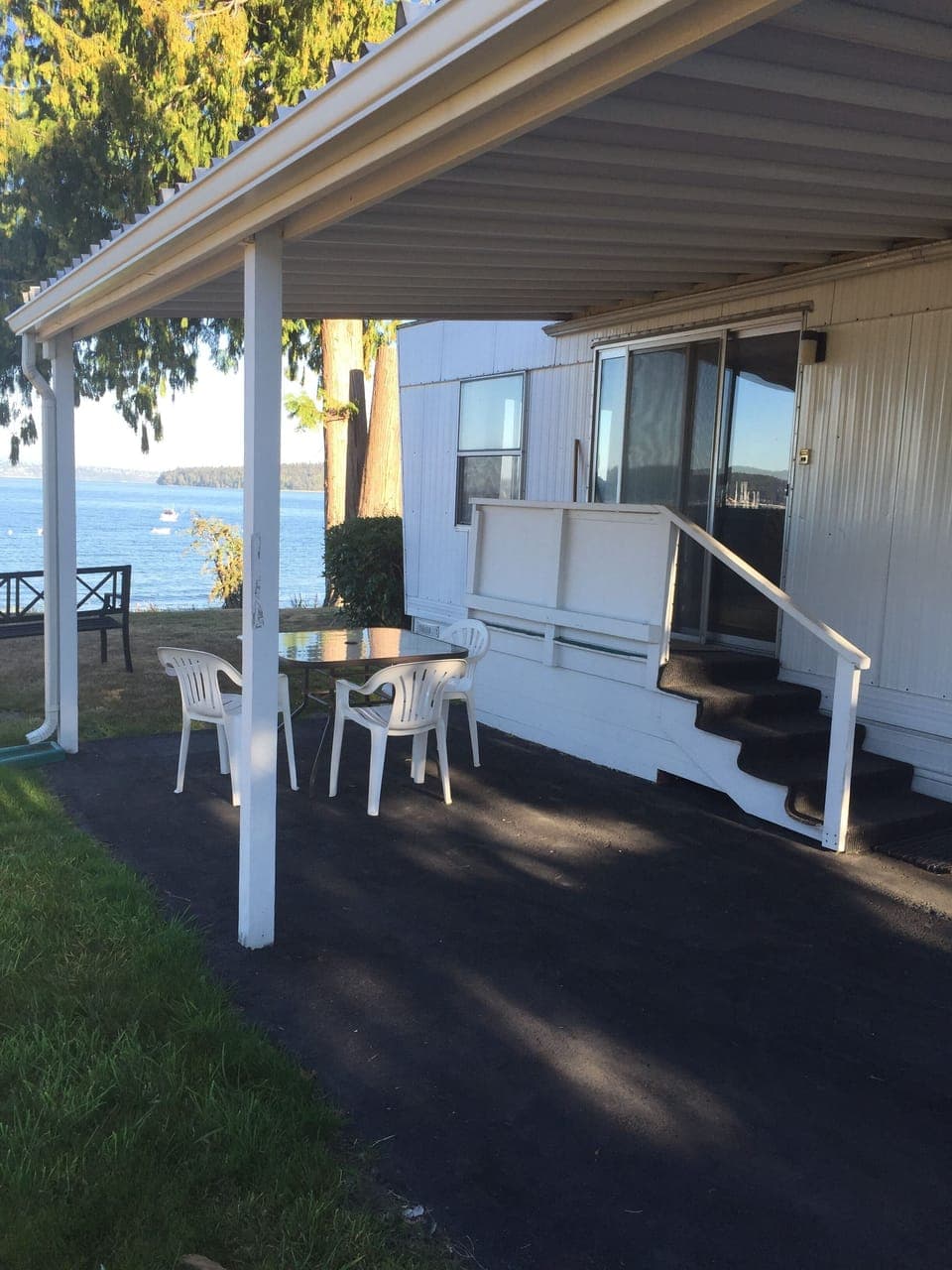 Entry is under the carport. Enjoy the view while picnicking.