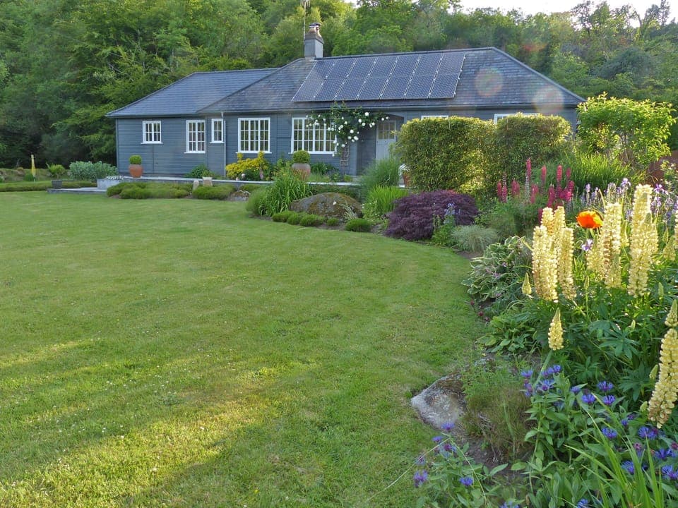Detached timber framed luxury home on Dartmoor surrounded by large  gardens.