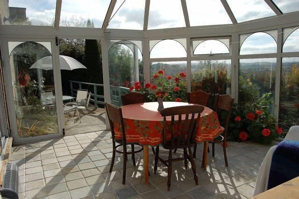 Conservatory and terrace with amazing westerly views.