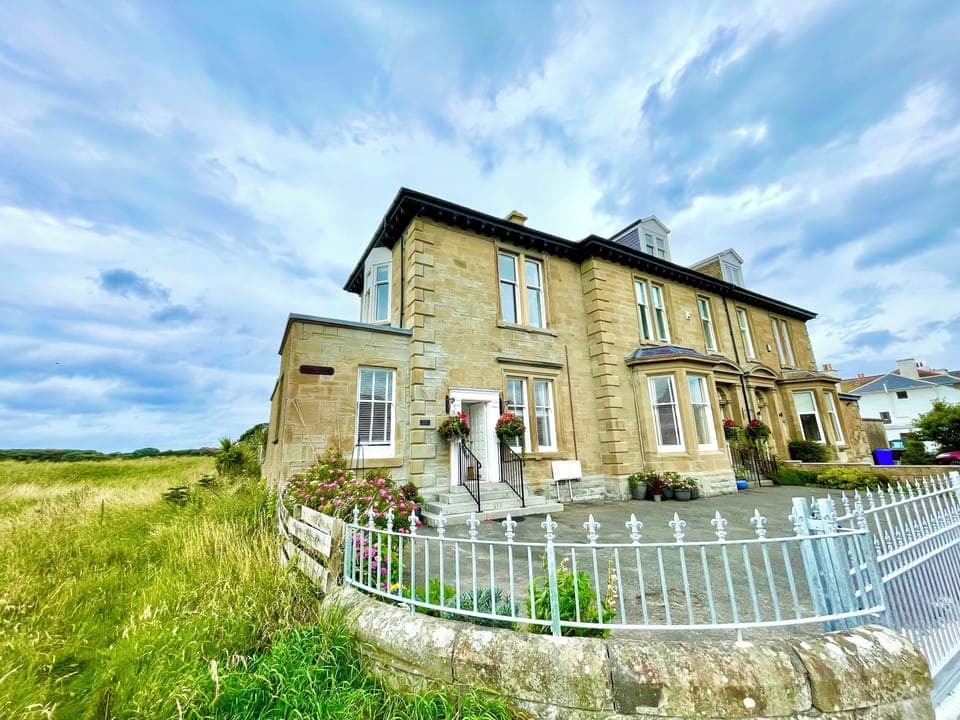 Spacious garden villa with enclosed driveway and private South facing garden.