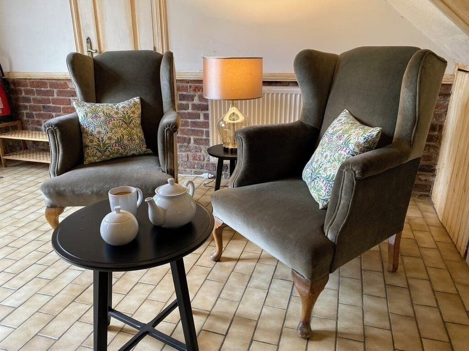 Comfortable arm chairs in main reception area