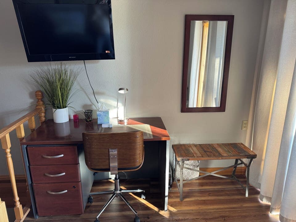 In the second bedroom on the main floor is a dedicated work area.