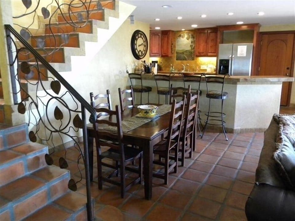 DINING ROOM ( seats 12)
w extension to table available. 
SEATS 8   4 barstools