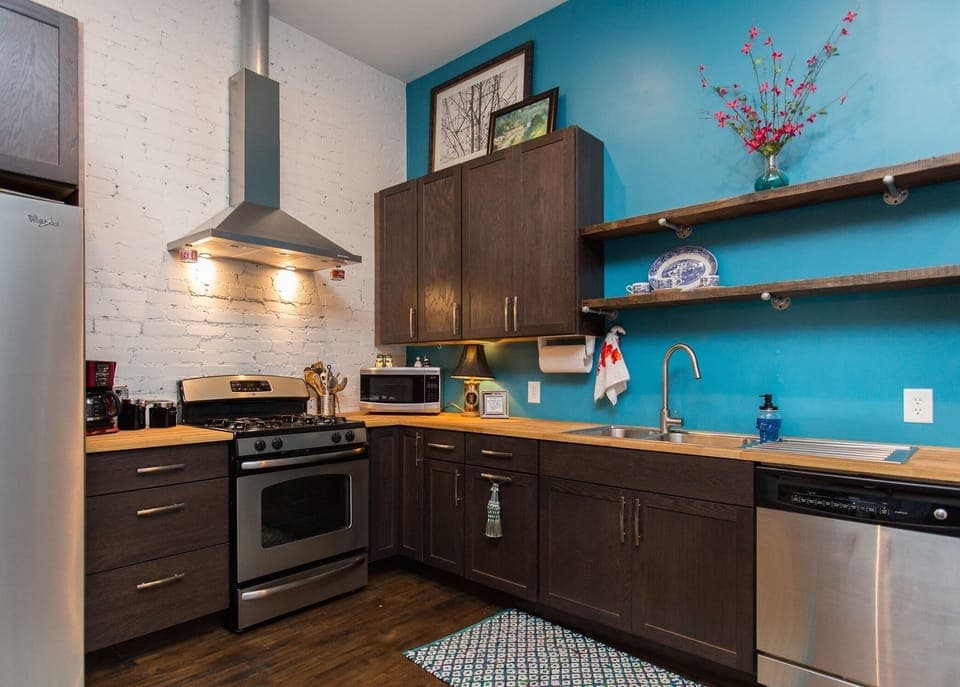 Full kitchen with gas stove and dishwasher.