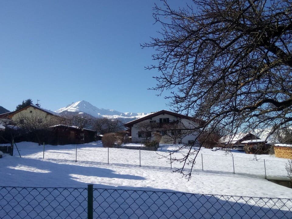 Sky, Snow, Building, Fence, Slope, Tree, Natural Landscape, Cloud, House, Freezing
