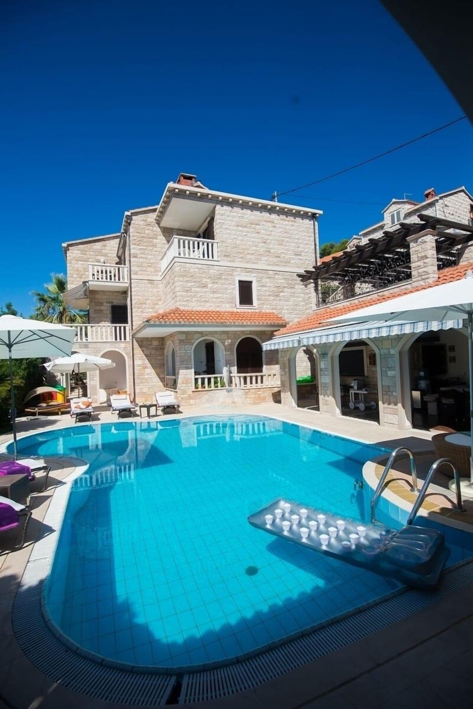 Spacious private pool and full villa view – ideal for groups up to 12