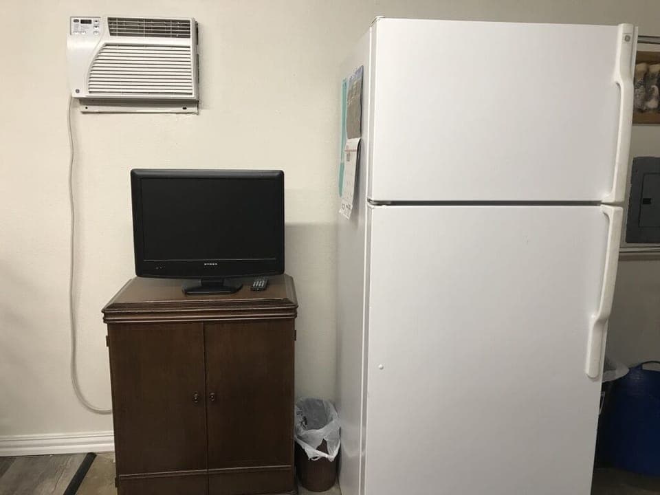 Full sized frig w/ freezer. TV with DVD player & family friendly DVD collection.