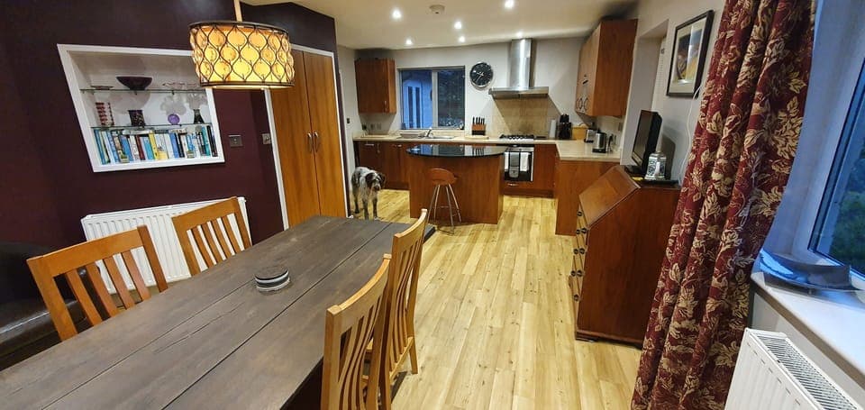 Open plan kitchen, looking from dining area