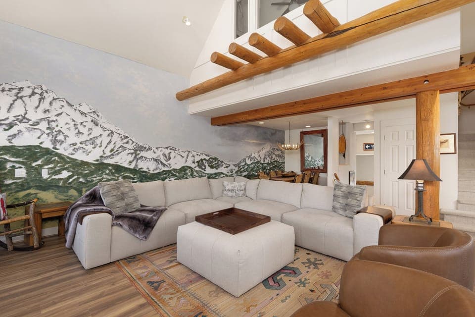 Large living room with new sectional sofa, open to dining, breathtaking views