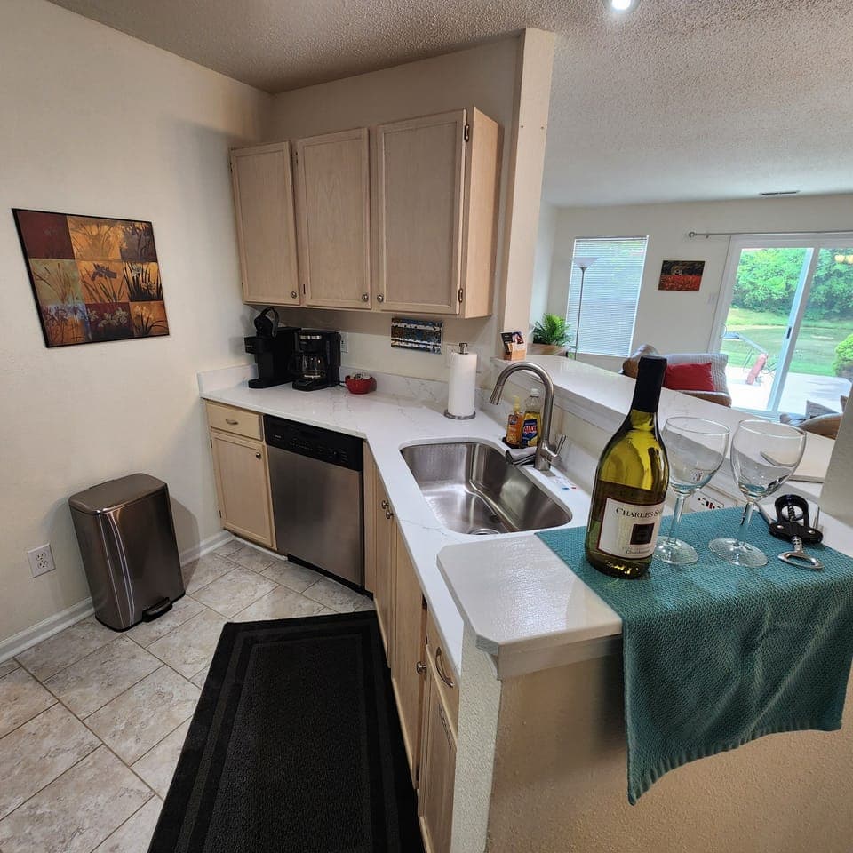 Kitchen has range, dishwasher, Keurig and drip coffee makers.



