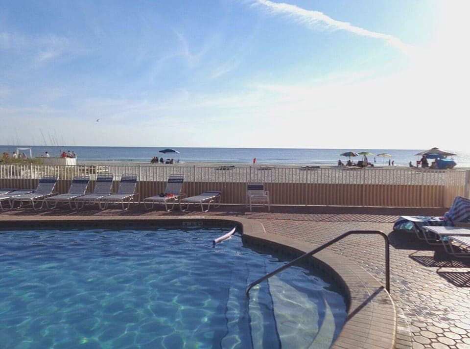 large heated pool overlooks Gulf of Mexico