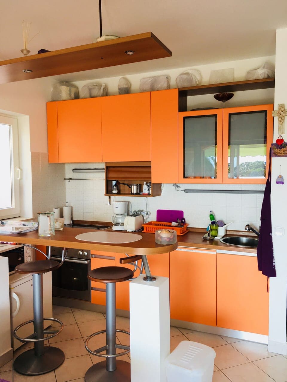 Kitchen with a bar