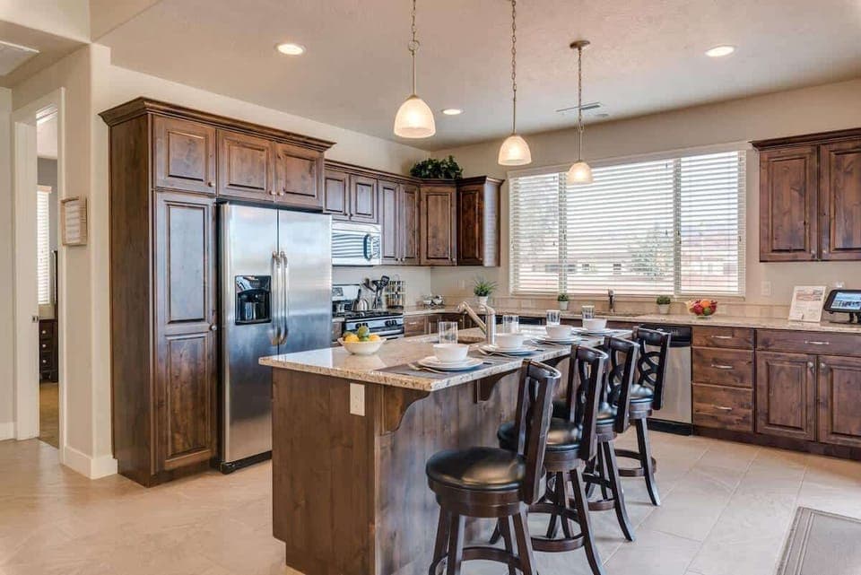 Gorgeous kitchen to prepare and enjoy meals with bar seating