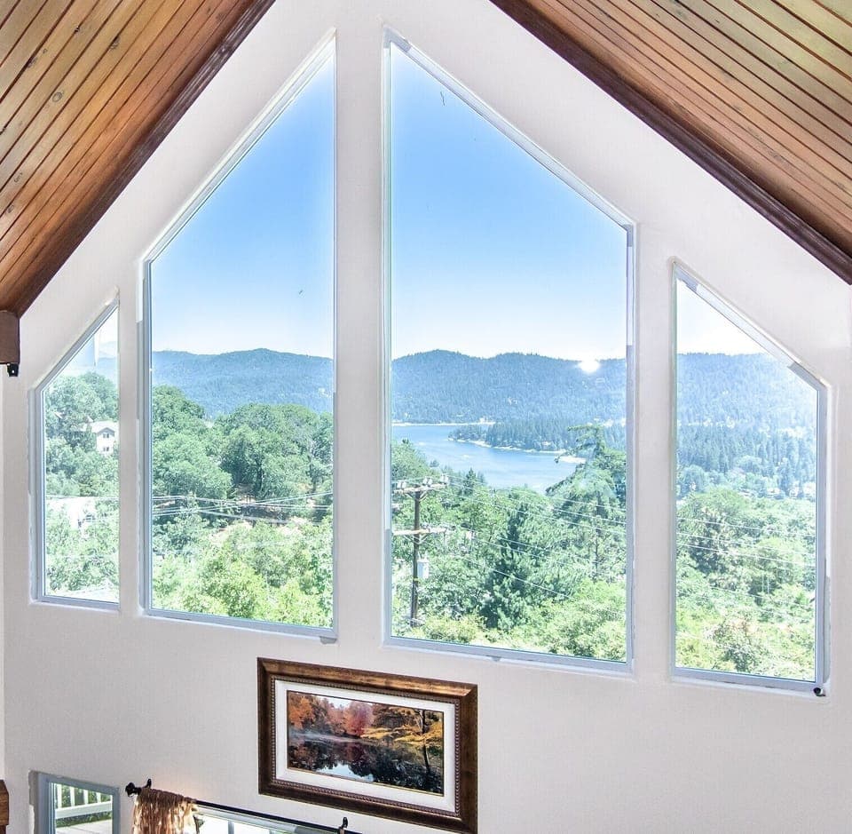 Amazing lake view from deck, living room, dining room & upstairs bedroom