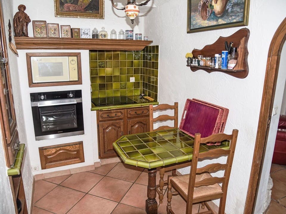 Furniture, Interior Design, Flooring, Wood, Kitchen, Floor, Room, Cabinetry, Countertop, Lighting