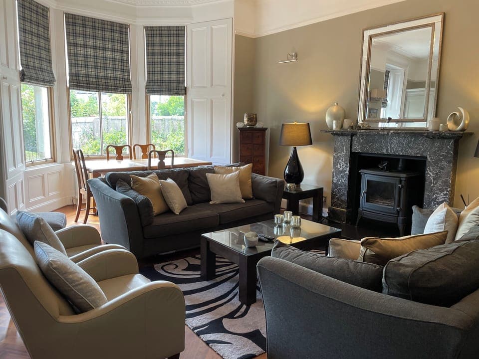 Ground floor - Beautiful bay windowed lounge with woodburning stove