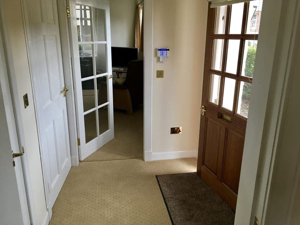 Entrance hall with guest toilet to left