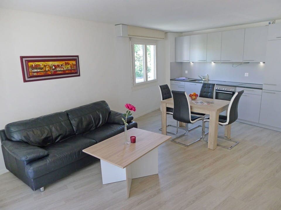 Furniture, Room, Property, Living Room, Floor, Coffee Table, Table, Interior Design, Laminate Flooring, Building