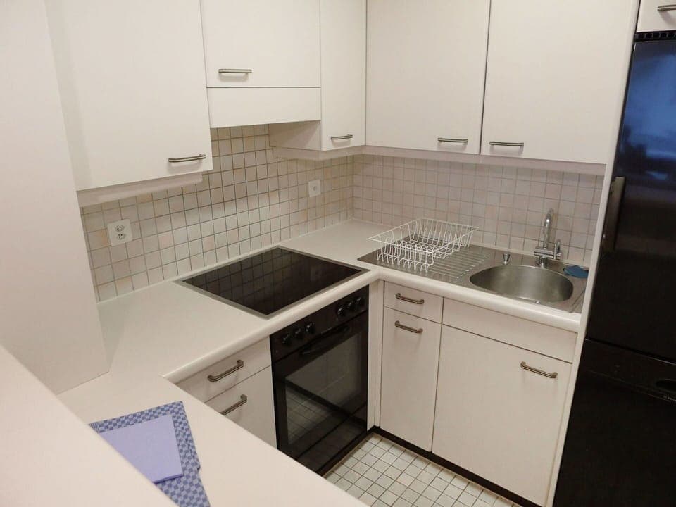 Property, Room, Countertop, Kitchen, Cabinetry, Tile, Furniture, Sink, Interior Design, Real Estate