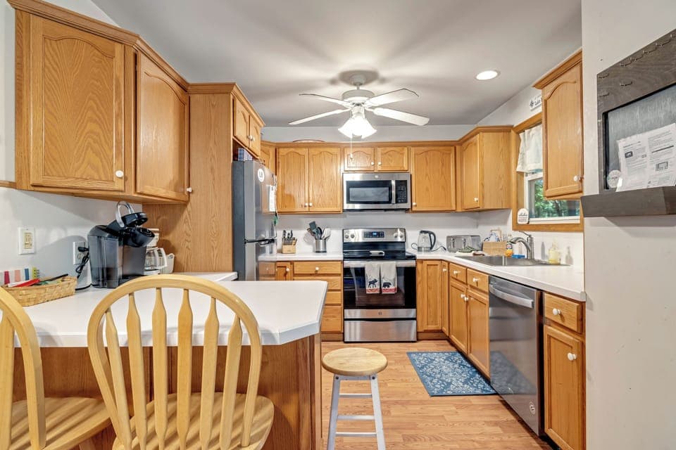 Kitchen with island counter seating.