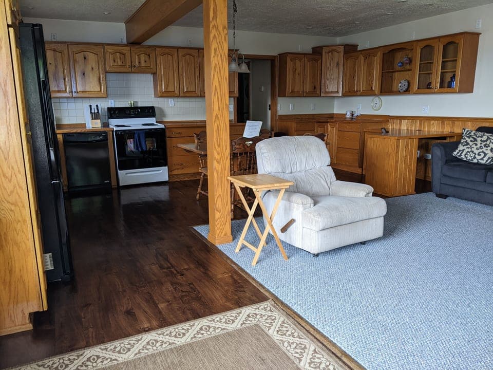 Entryway view of Living Space and Kitchen.