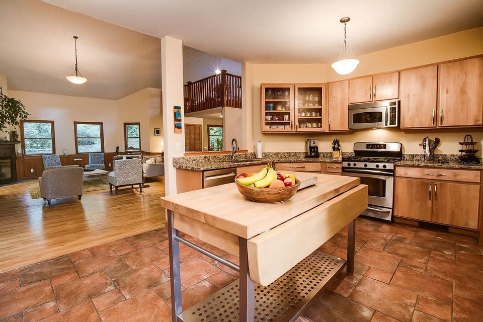 The open kitchen w/ view to the Great Room