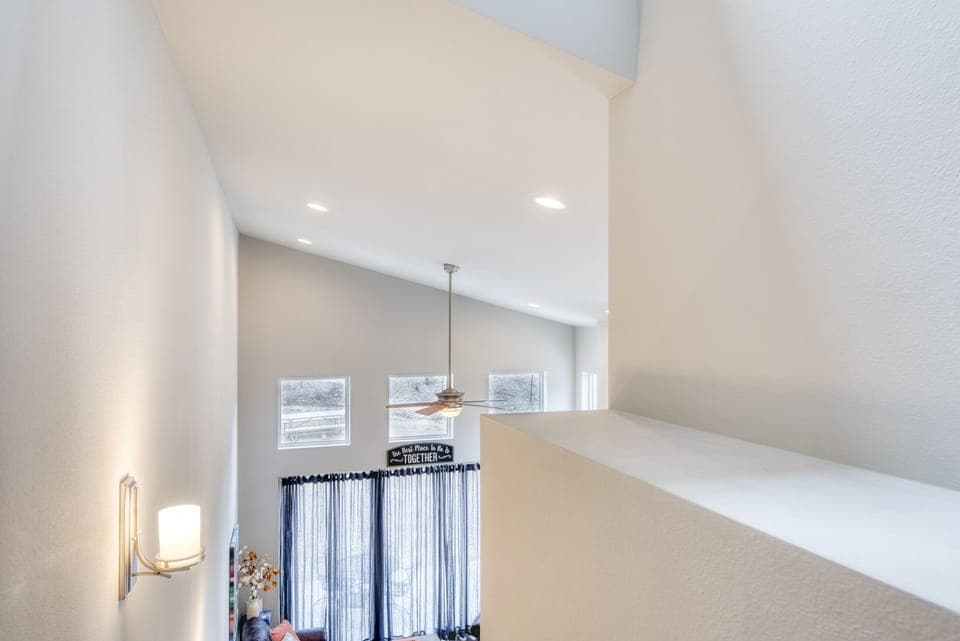 Stairway - Upper portion of the stairway with accentuating the vaulted ceiling of the living area below.