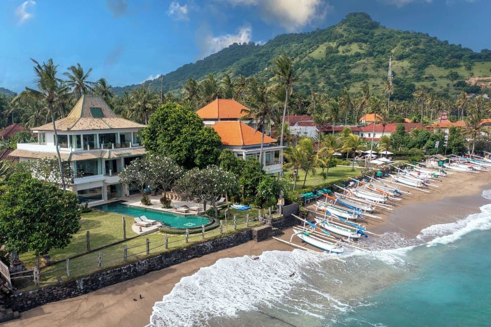 Villa Cocoa Maya perched on the edge of the beach.