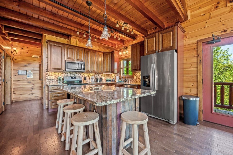 Ridge View Lodge - up-to-date kitchen with soft-close cabinets, stainless steel appliances, and granite. Island seats 4