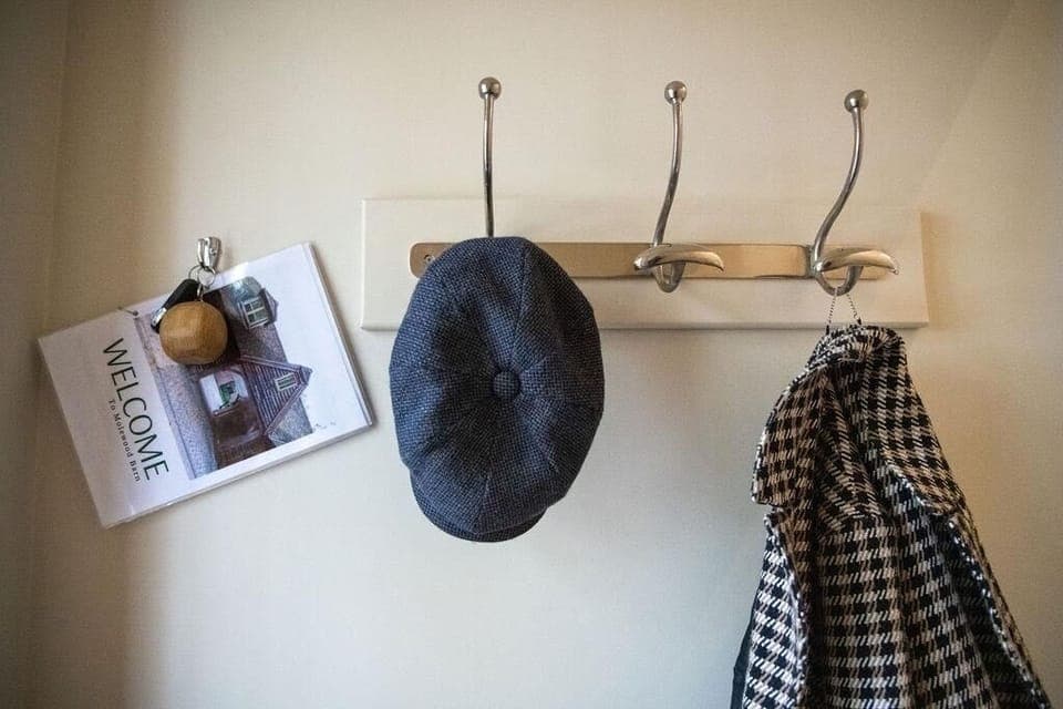 A place to hang your hat.  Hallway entrance 