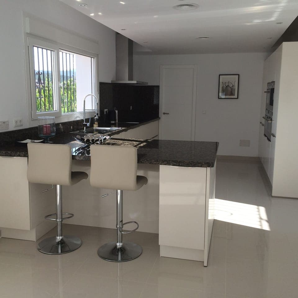 Kitchen - fully fitted with marble worktops.  Double ovens, etc