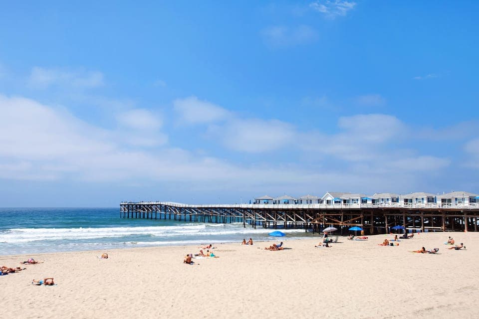 Step out the door to sandy beach across the street