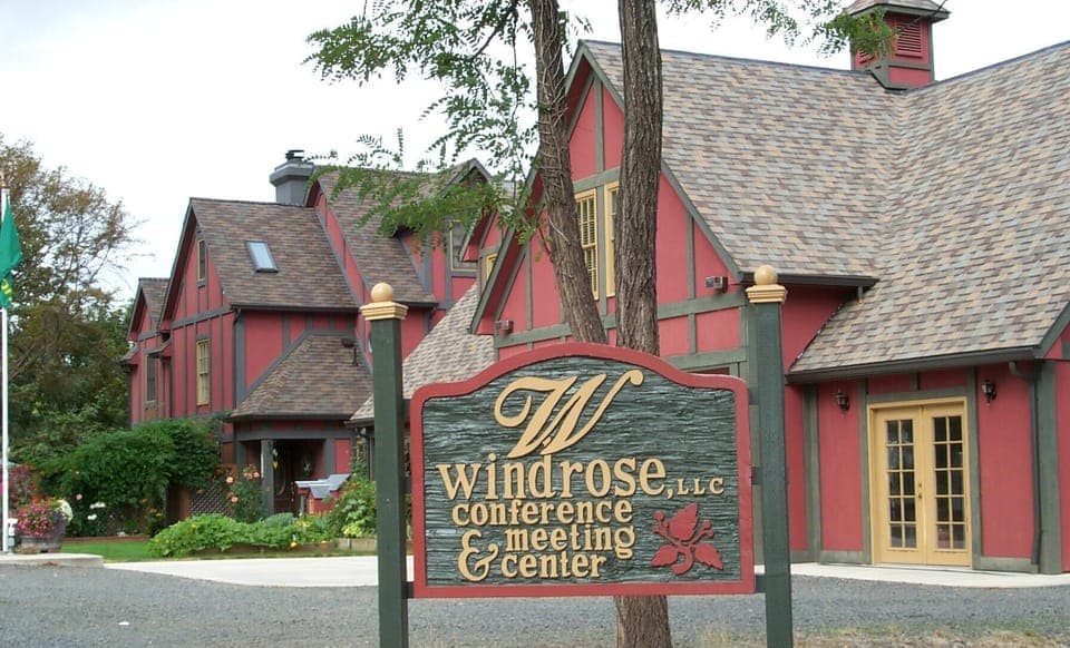 Road view.  Vacation rental located between the 2 buildings and down the stairs.