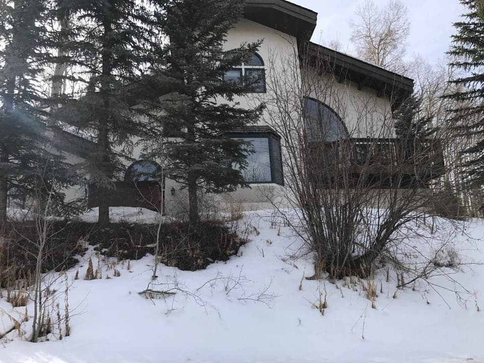 Front of the house in winter from the street