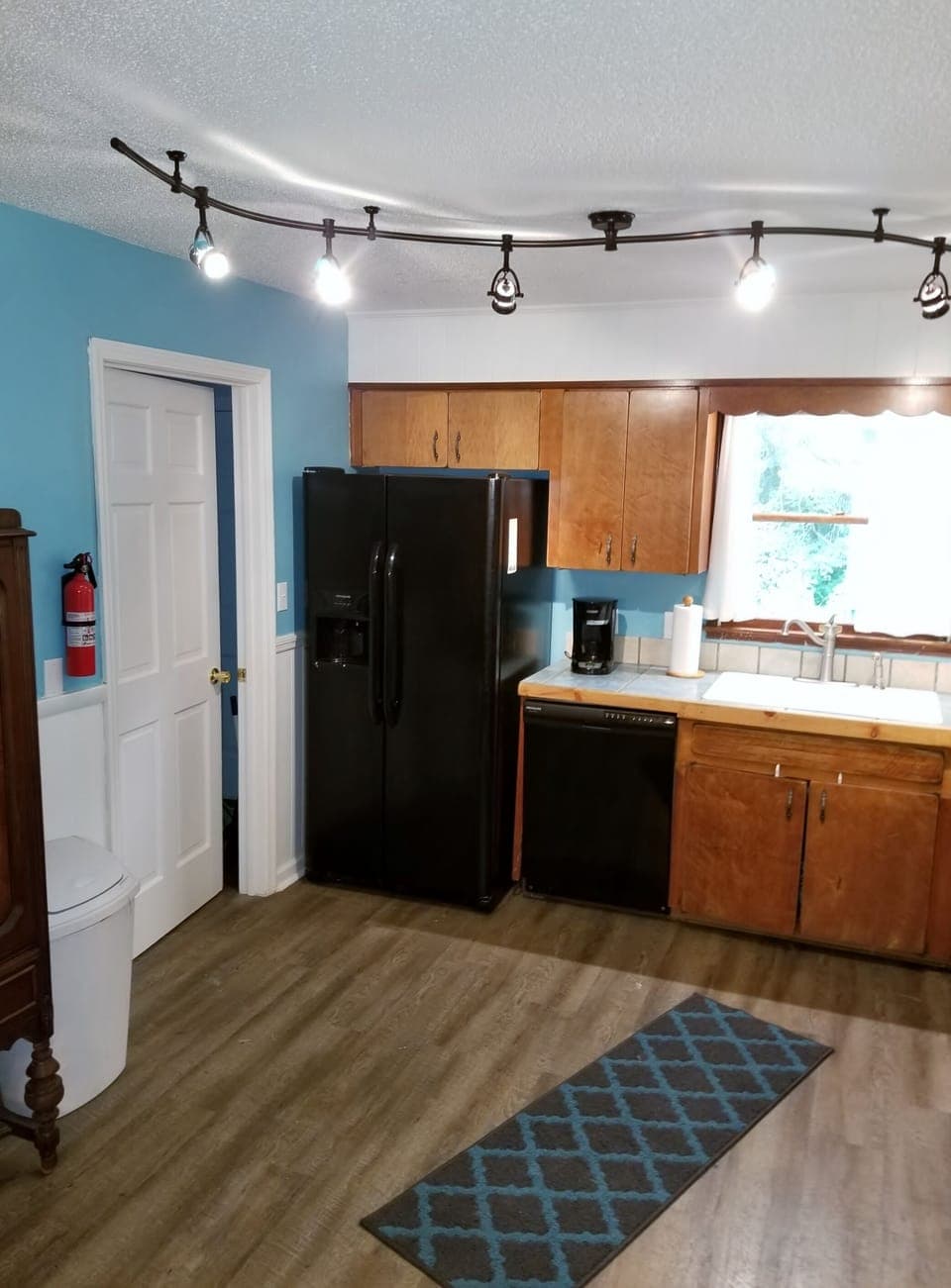 New appliances, sink, stove, fridge & new tiled countertops