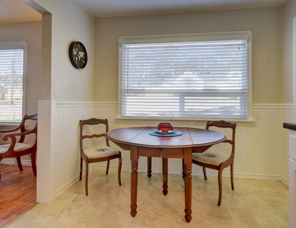 dining table expands & easily moved to area next room for guests & celebrations 
